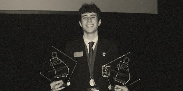 Nathan with awards